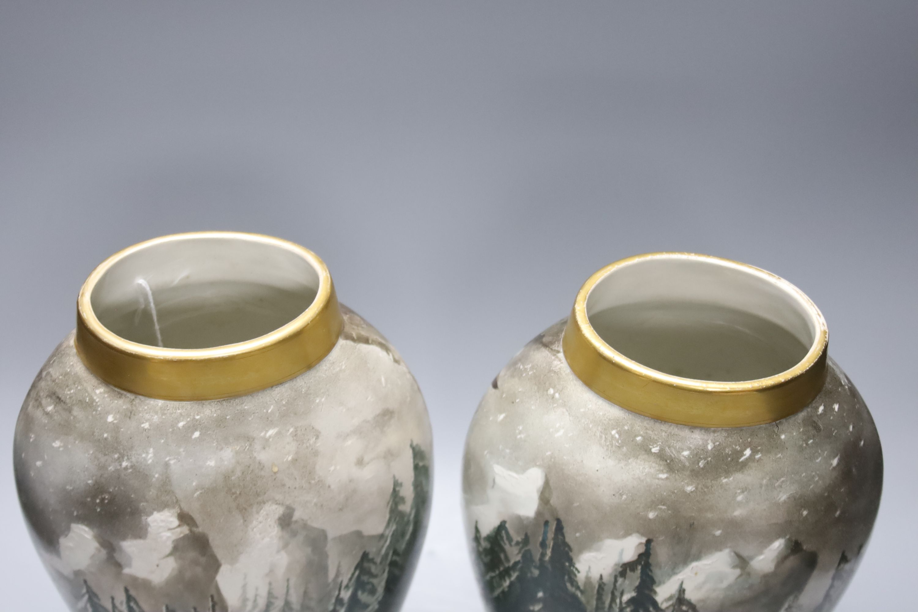 A pair of late 19th century French St Denis painted vases, decorated with birds in a landscape, signed by the artist, height 35cm
